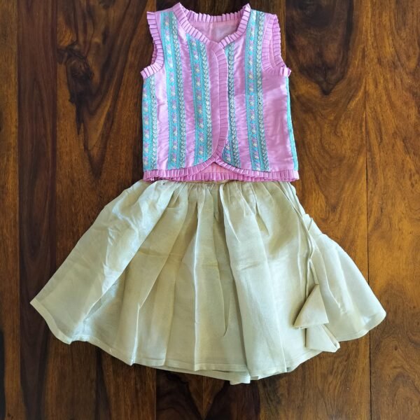 Girls’ pink silk embroidered top with golden flared skirt – traditional festive outfit for kids