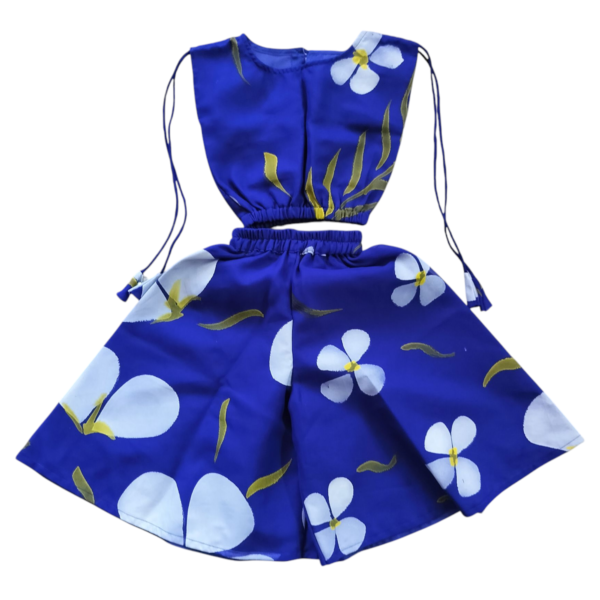 “Girls’ blue co-ord set with hand-painted white and yellow floral print – sleeveless top and flared shorts”